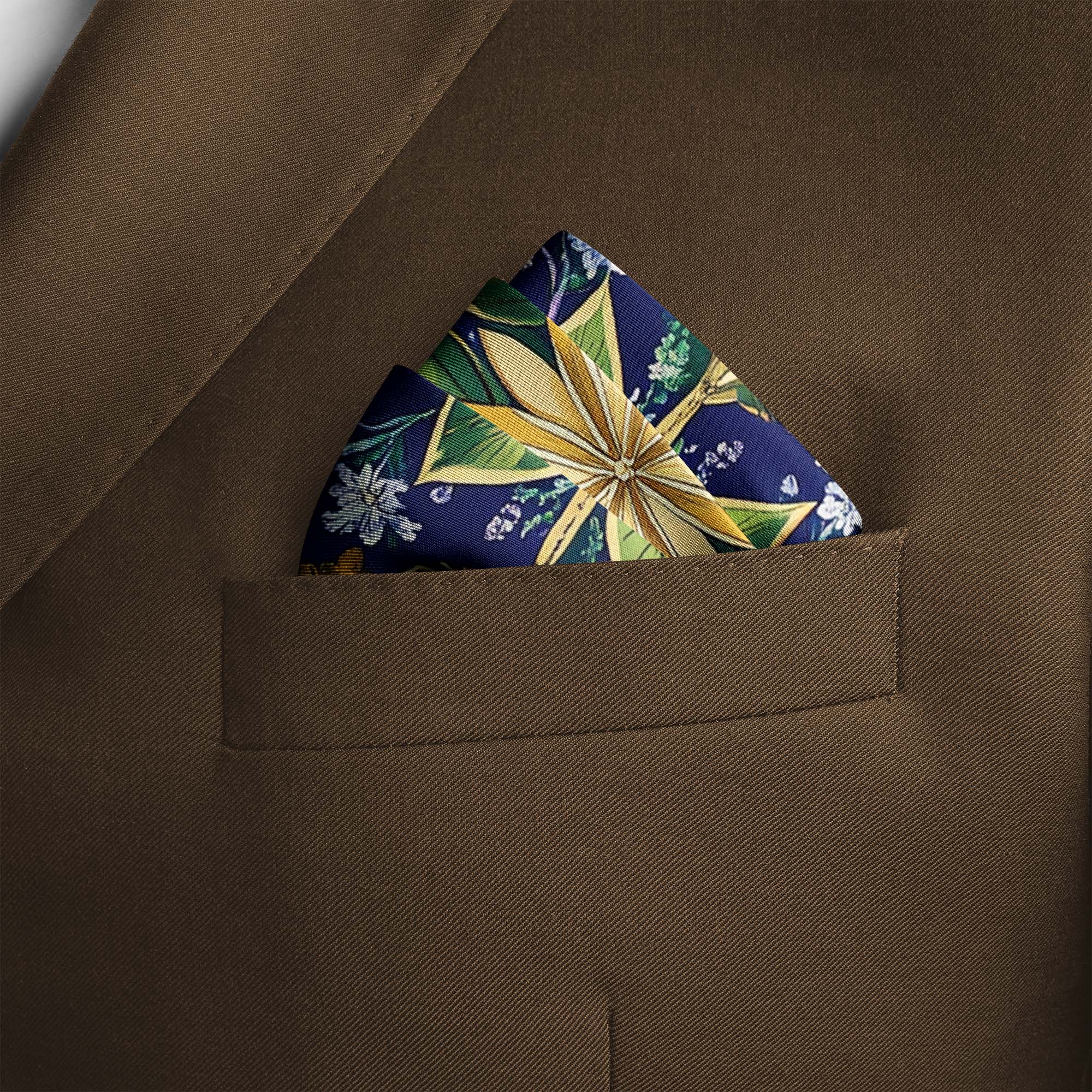 A VIBRANT FLORAL SILK POCKET SQUARE A VIBRANT FLORAL SILK POCKET SQUARE