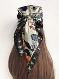 A HARMONIOUS SILK HEAD SCARF